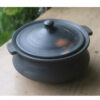 clay pot cooking on electric stove